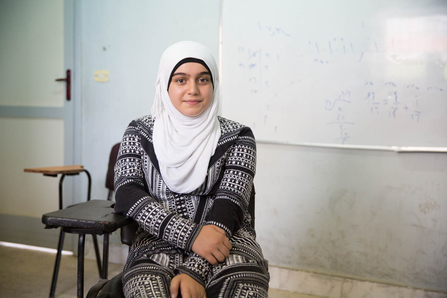  Abeer*, 15, is a student at the remedial classes offered by NGO Ansan and Plan International. Her family fled Syria and arrived in Egypt 2,5 years ago. Her life is completely different now than before. In Syria she would be allowed to hang out with her friends, while here she is only allowed to see them at school, and she is not allowed to leave the home by herself due to safety concerns. Her family goes on a family trip once a month, besides that they stay at home. In her free time she likes to draw, watch TV and play sports. She hopes to obtain a PhD in pharmaceutical studies and to open a large chain of pharmacies. Her favorite film is Frozen. 
