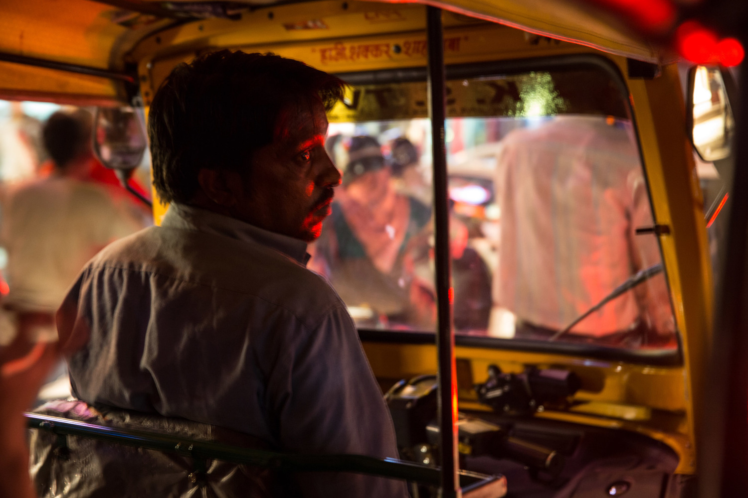  Many of the neighborhood’s men make their living as tuk-tuk drivers. They work long hours for meager pay. 