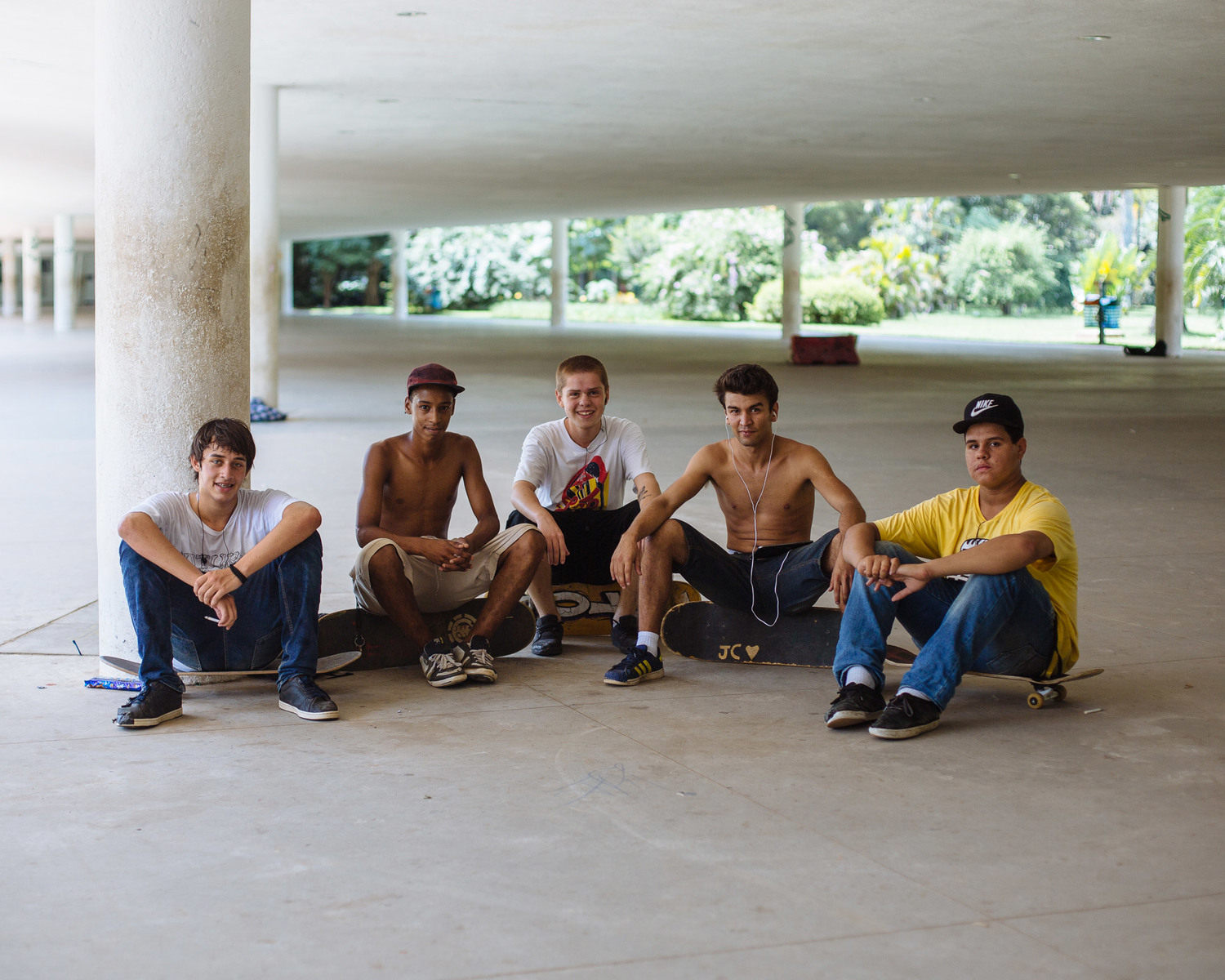  Nicholas, 18 and Erick, 17 take a break from skating with their friends. 